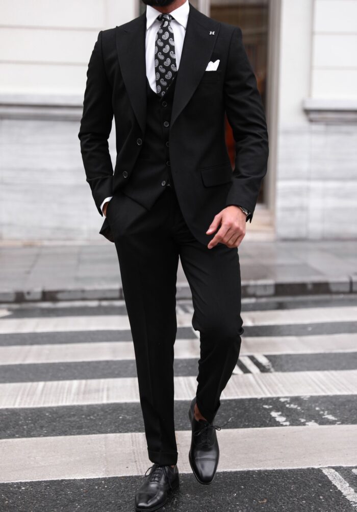 Blackwell <p>Slim fit all black men’s three piece suit with peak lapels</p>