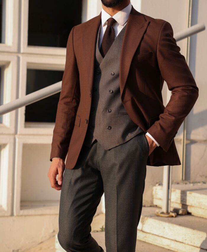 Cranberry Street <p>Slim fit chocolate brown mixed suit with basket weave waistcoat</p>
