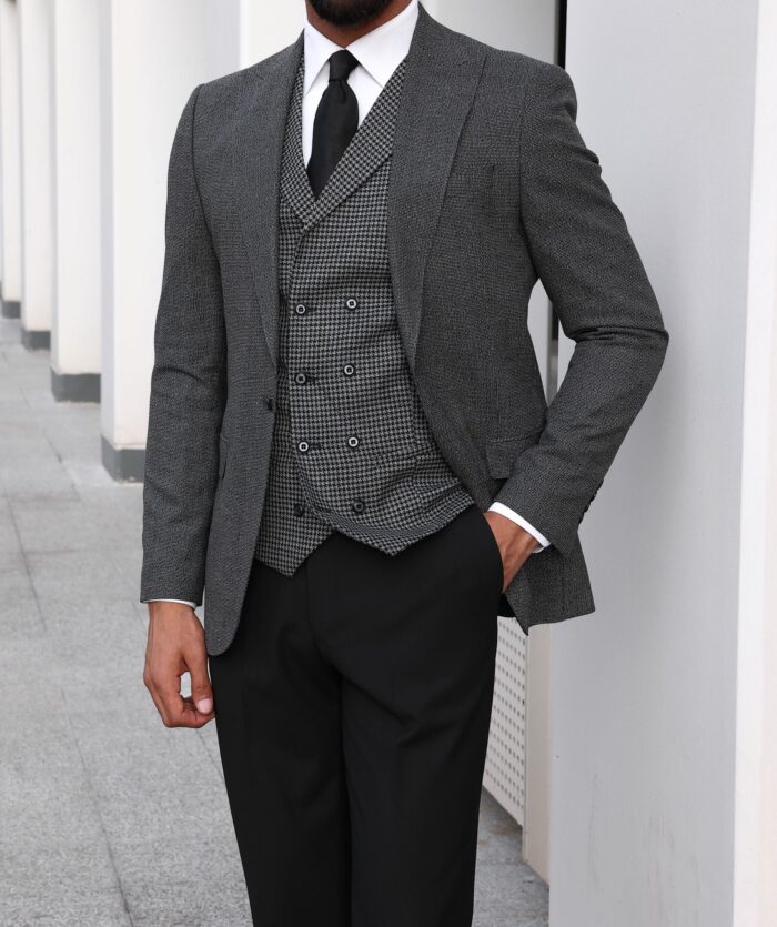 Coventry Street <p>Slim fit Birdseye dark grey mixed suit with houndstooth waistcoat</p>

