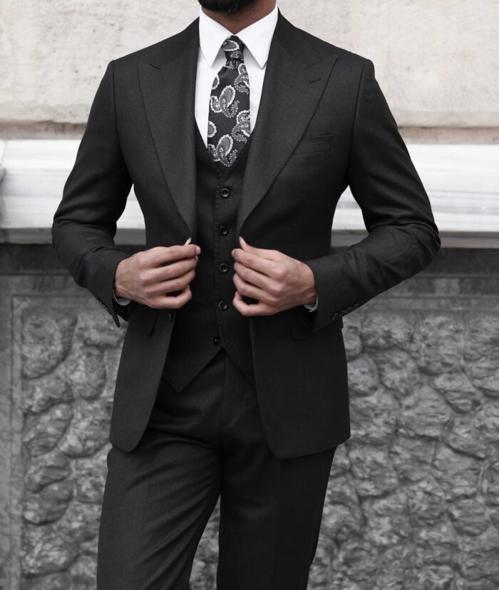 Lauderdale Place <p>Slim fit all black three piece men’s suit with peak lapels</p>