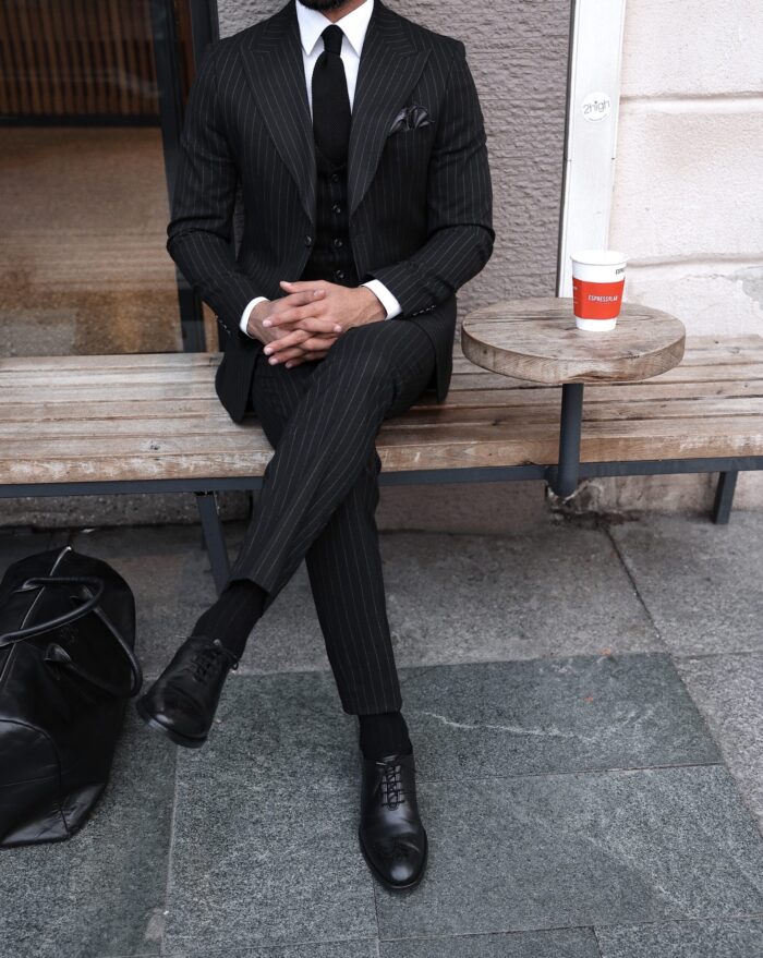 Magpie Alley Slim fit all black pinstripe  three piece men's suit with peak lapels