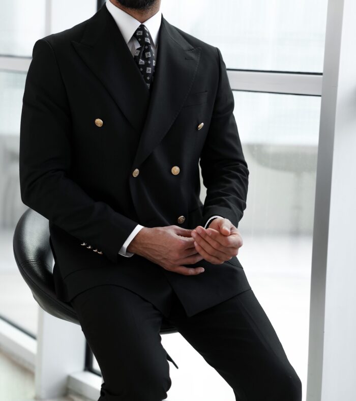 Oat Lane Slim fit all black double breasted two piece men’s suit with gold buttons and peak lapels