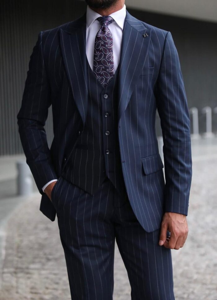 Gosport Slim fit dark blue pinstripe men's three piece suit with peak lapels