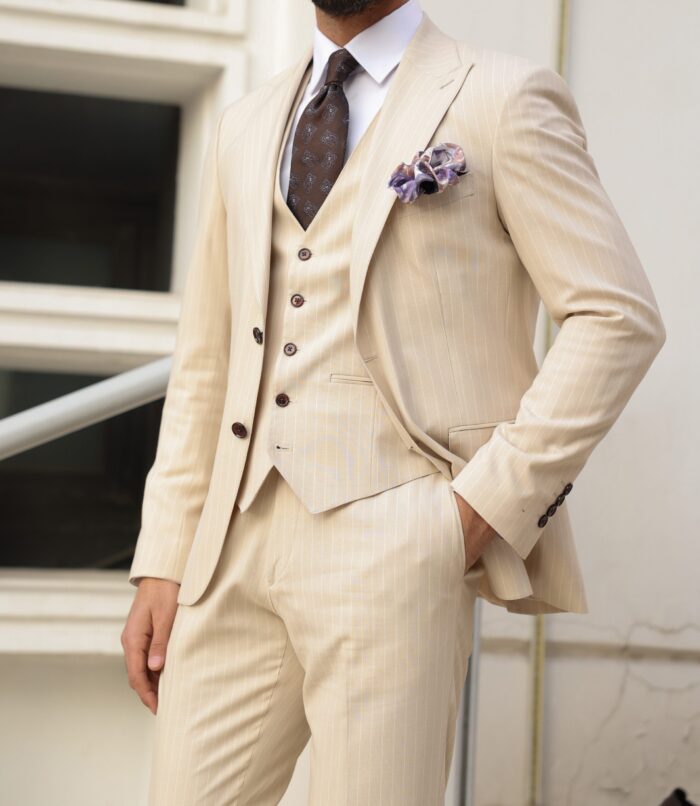 Spitalfields Slim fit cream three piece men's suit with peak lapels