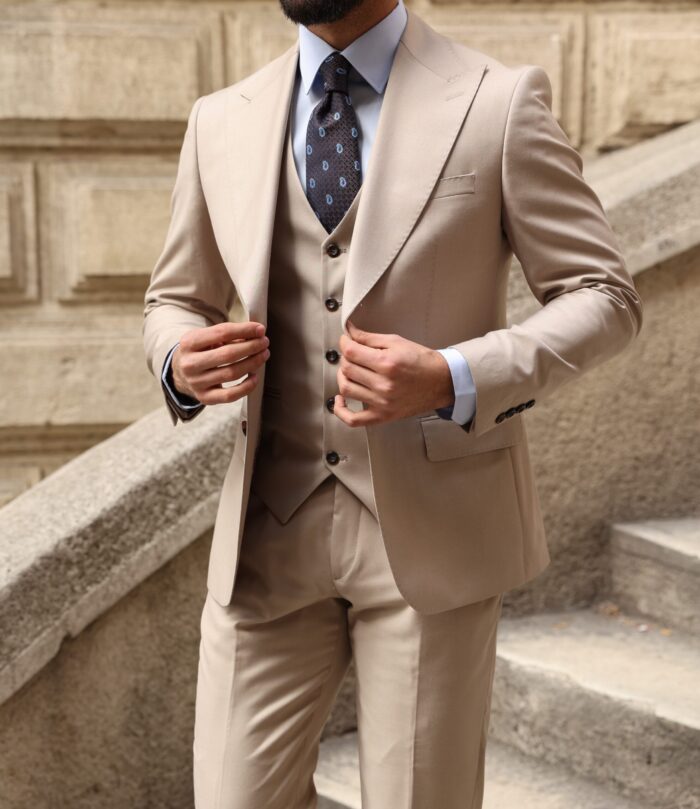 Arbutus Street <p>Slim fit all cream men’s three piece suit with peak lapels</p>
