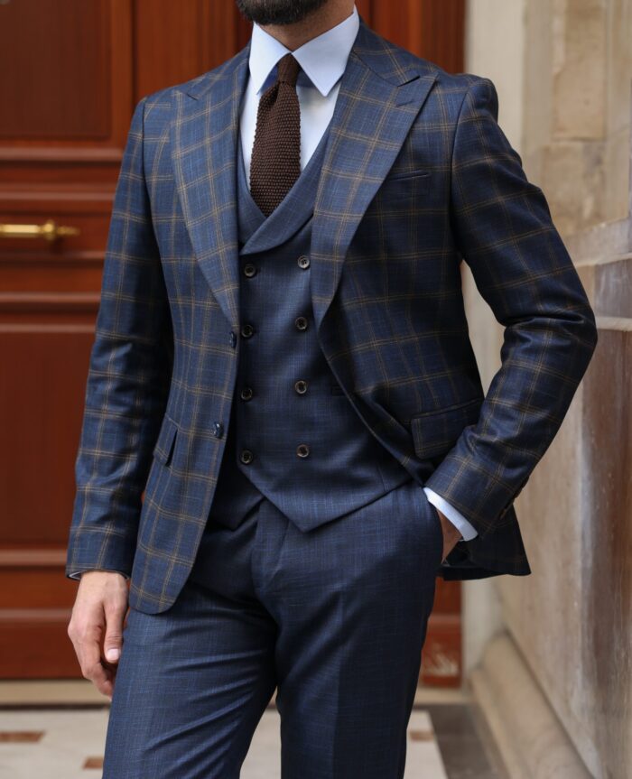 Argyle Walk Slim fit dark blue chequered mixed three piece suit with a double breasted waistcoat and peak lapels