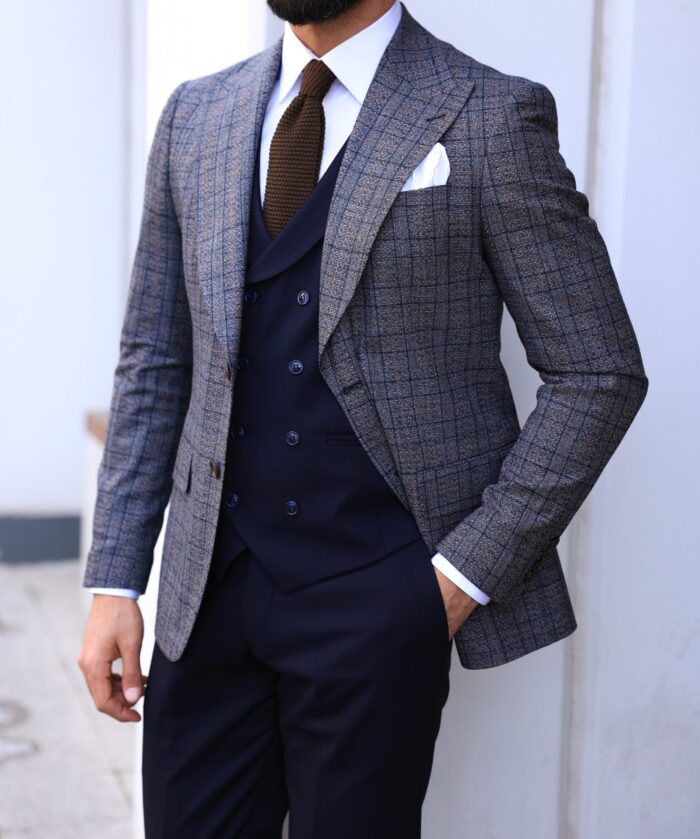 Culpeper Street Slim fit light grey and navy chequered mixed three piece suit with a double breasted waistcoat and peak lapels