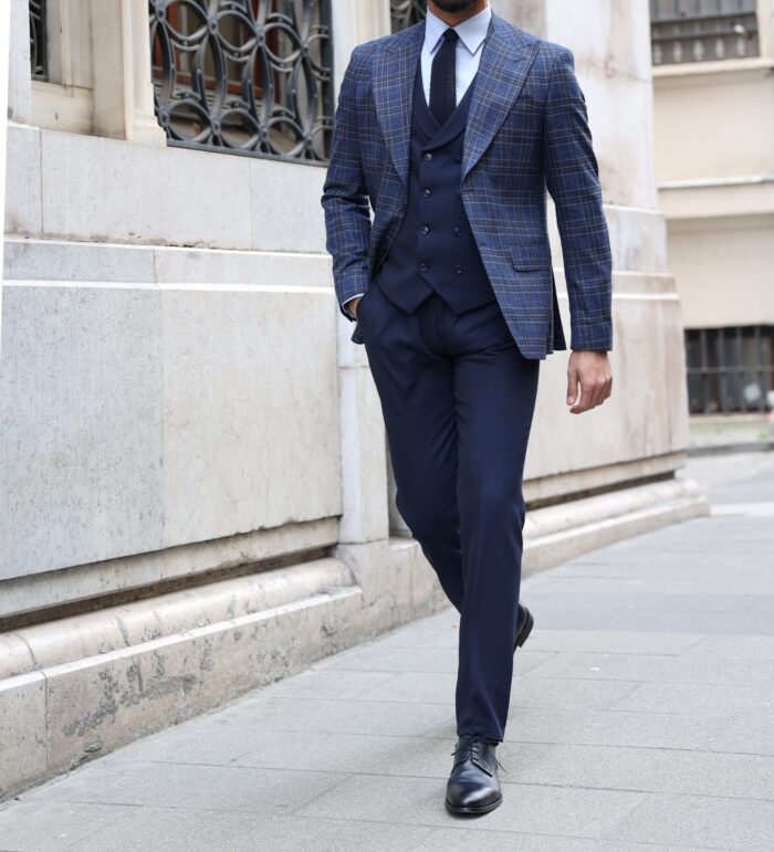 Fairbairn Road Slim fit dark blue chequered mixed three piece suit with a double breasted waistcoat and peak lapels