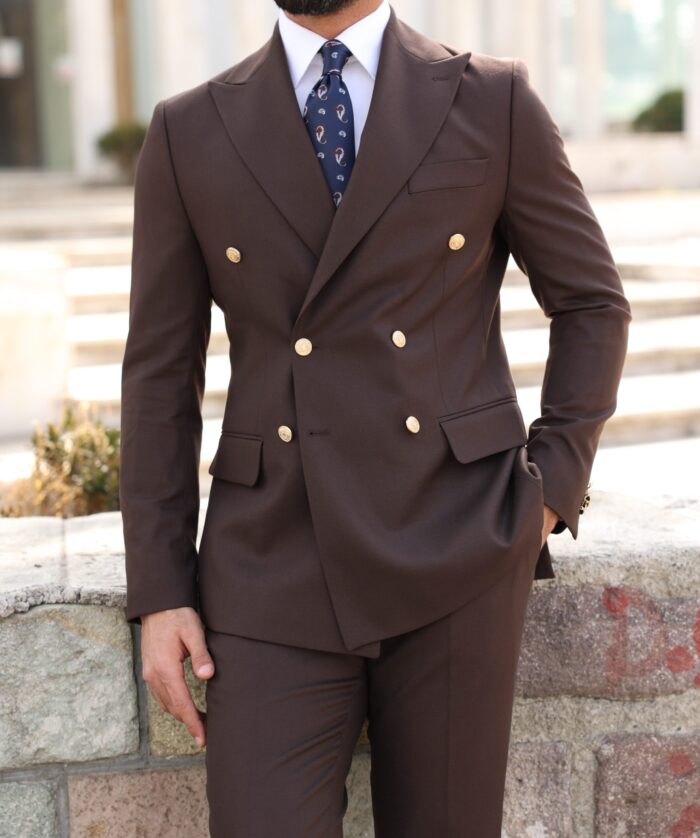 Mecklenburgh Place <p>Slim fit chocolate brown double breasted men’s two piece suit with decorative gold buttons and peak lapels</p>