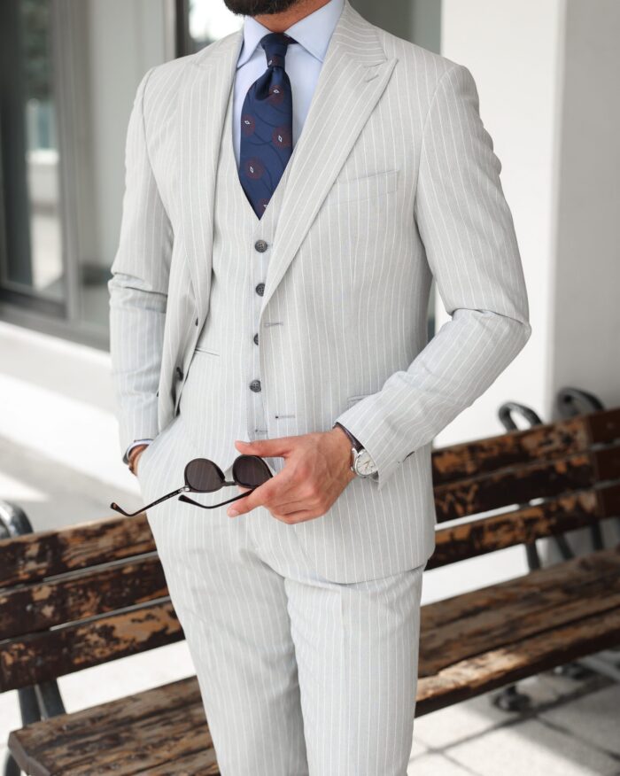 Middle Row Slim fit light grey pinstripe men's three piece suit with peak lapels
