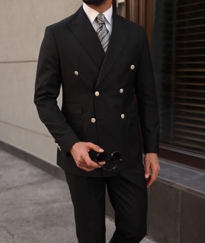 Keen's Mews Tailored slim fit all black double breasted men's suit with decorative gold buttons and peak lapels
