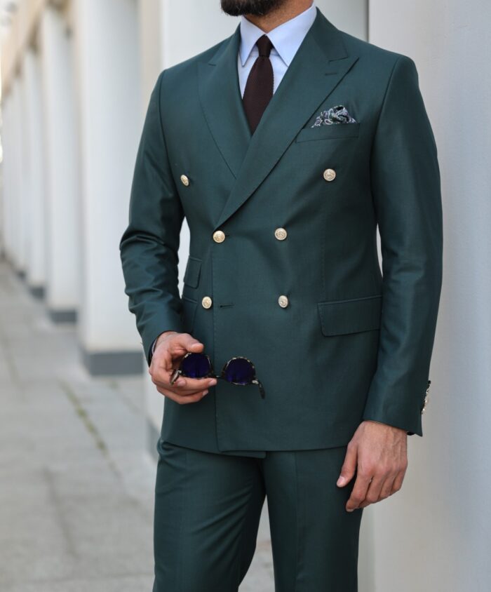 Keppel Street Tailored slim fit forest green double breasted men's suit with decorative gold buttons and peak lapels