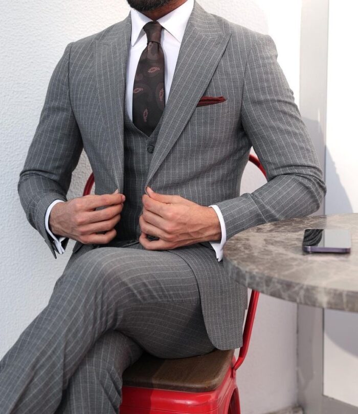 Taylor's Buildings Tailored slim fit light grey pinstripe men's three piece suit with peak lapels