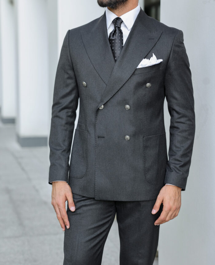 Seeders Court Slim fit all charcoal grey double breasted two piece men’s suit with peak lapels with decorative silver buttons.