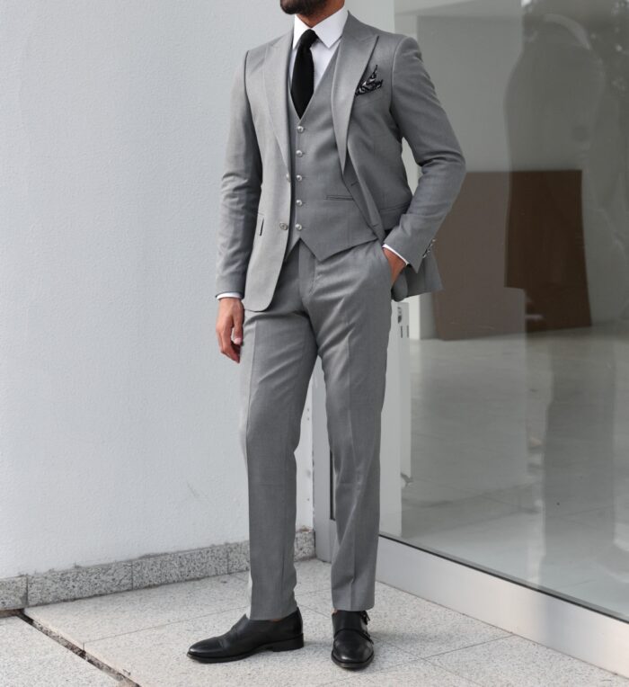 Sanders Close Slim fit mid grey men’s three piece suit with peak lapels and with decorative silver buttons