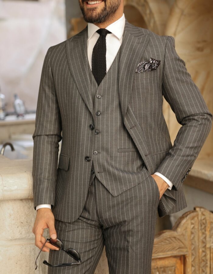 Hammersmith Tailored slim fit dark grey pinstripe men’s three piece suit with peak lapels