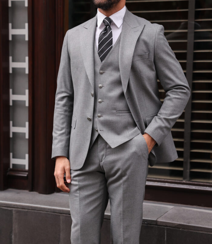 Shire Lane Slim fit mid grey men’s three piece suit with peak lapels  and with decorative silver buttons