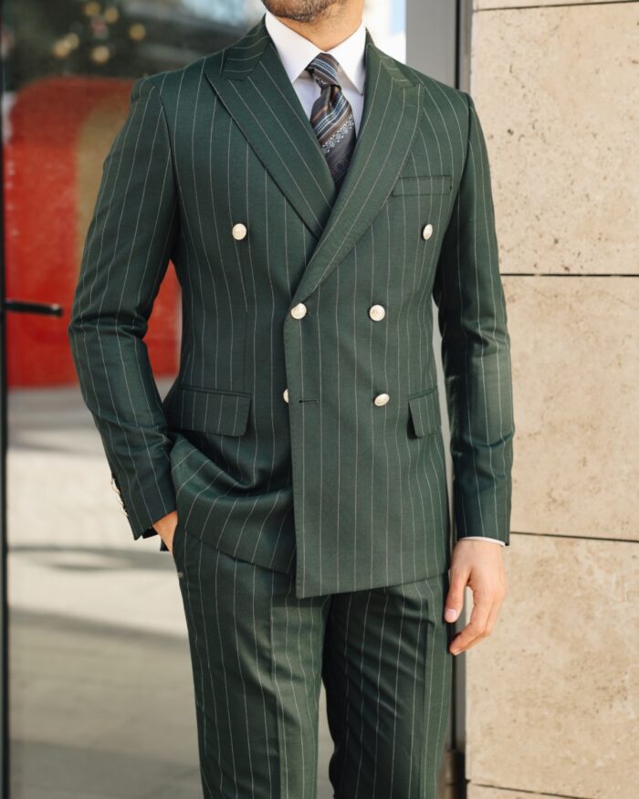 The Strand Tailored slim fit pine green pinstripe double breasted men's suit with peak lapels with decorative gold buttons