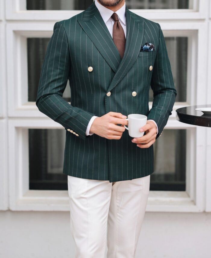 Bethnal Green A tailored slim fit double breasted men’s suit in a mix of green double breasted pinstriped  and white  with decorative gold buttons.