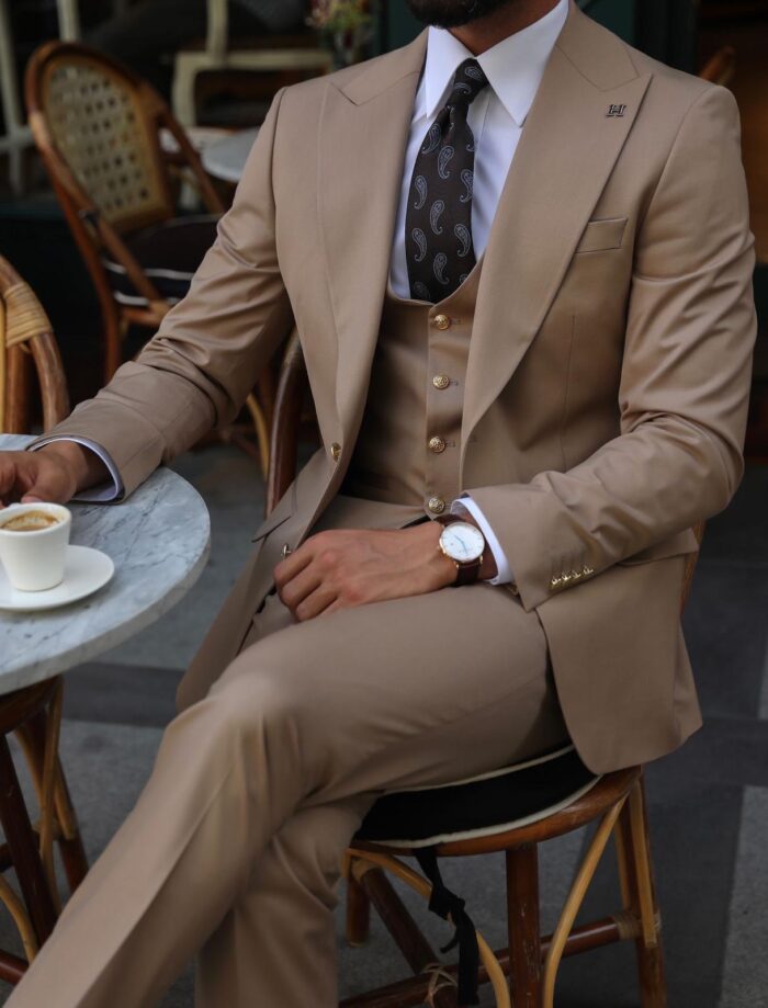 Forest Road Slim fit cream coloured three piece men’s suit with a peak lapels With decorative gold buttons