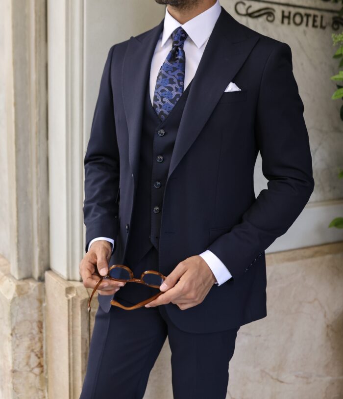 Durham Street <p>Slim fit dark navy blue men’s three piece suit with peak lapels</p>
